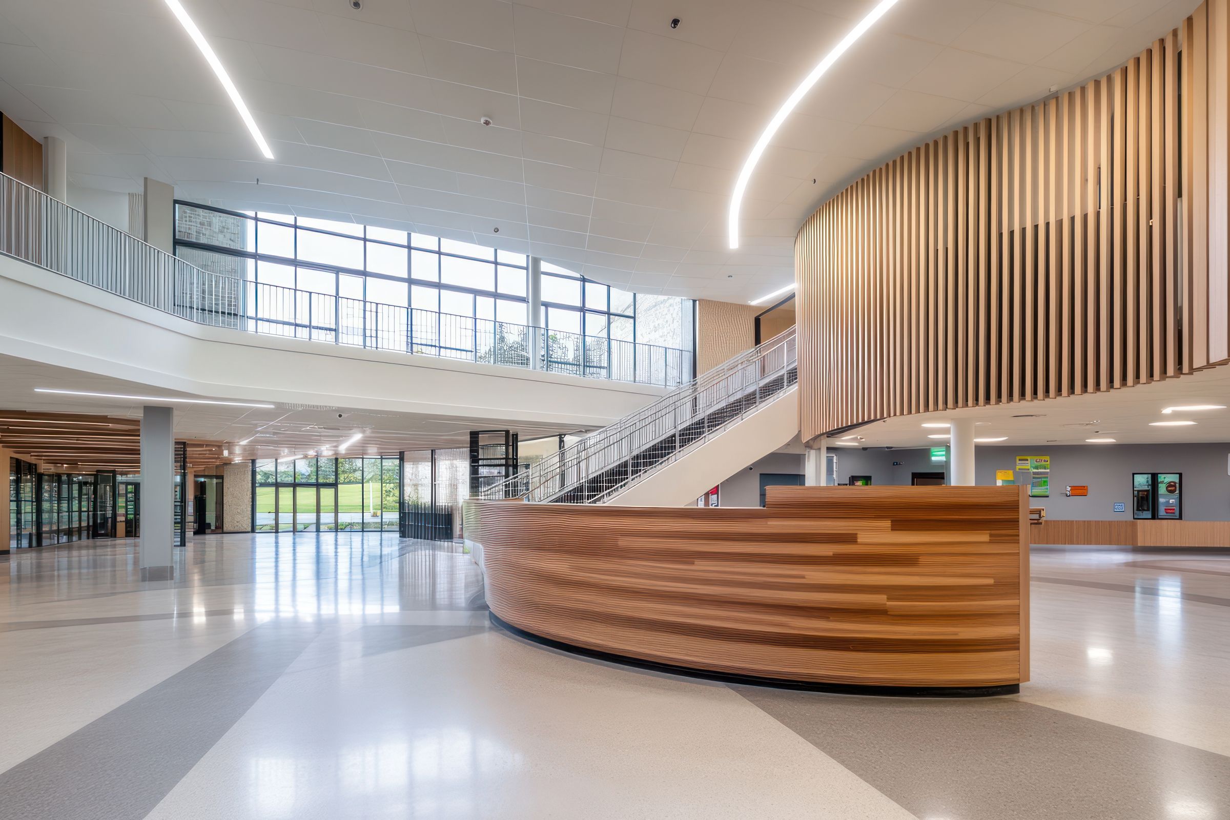 The bright reception atrium of a modern school building